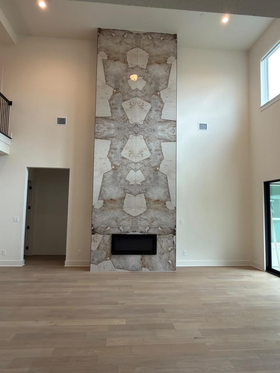 Finished stone-look fireplace tower